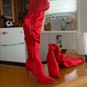 Thigh high red satin boots